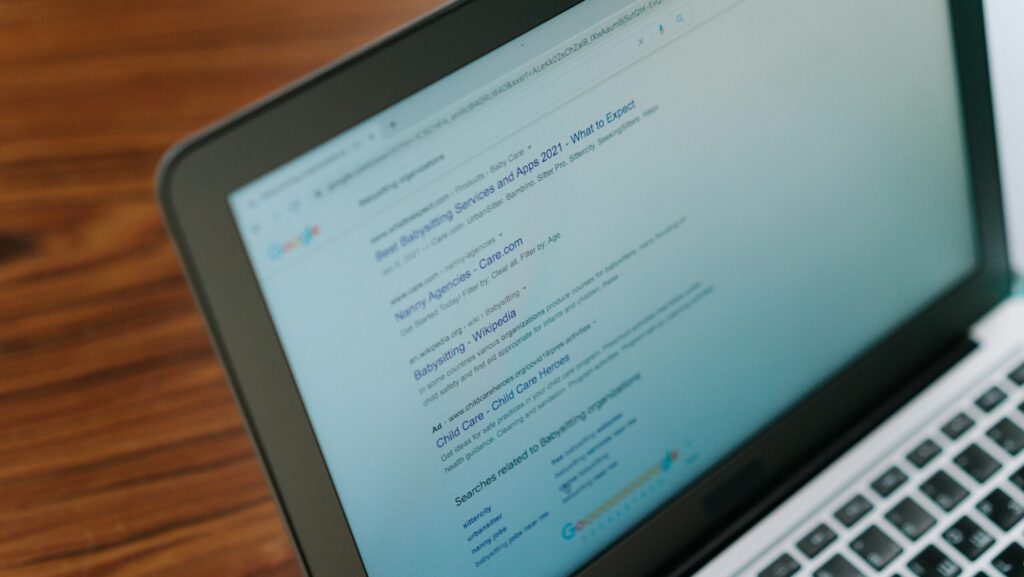 Modern laptop displaying search engine results for marketing strategies.